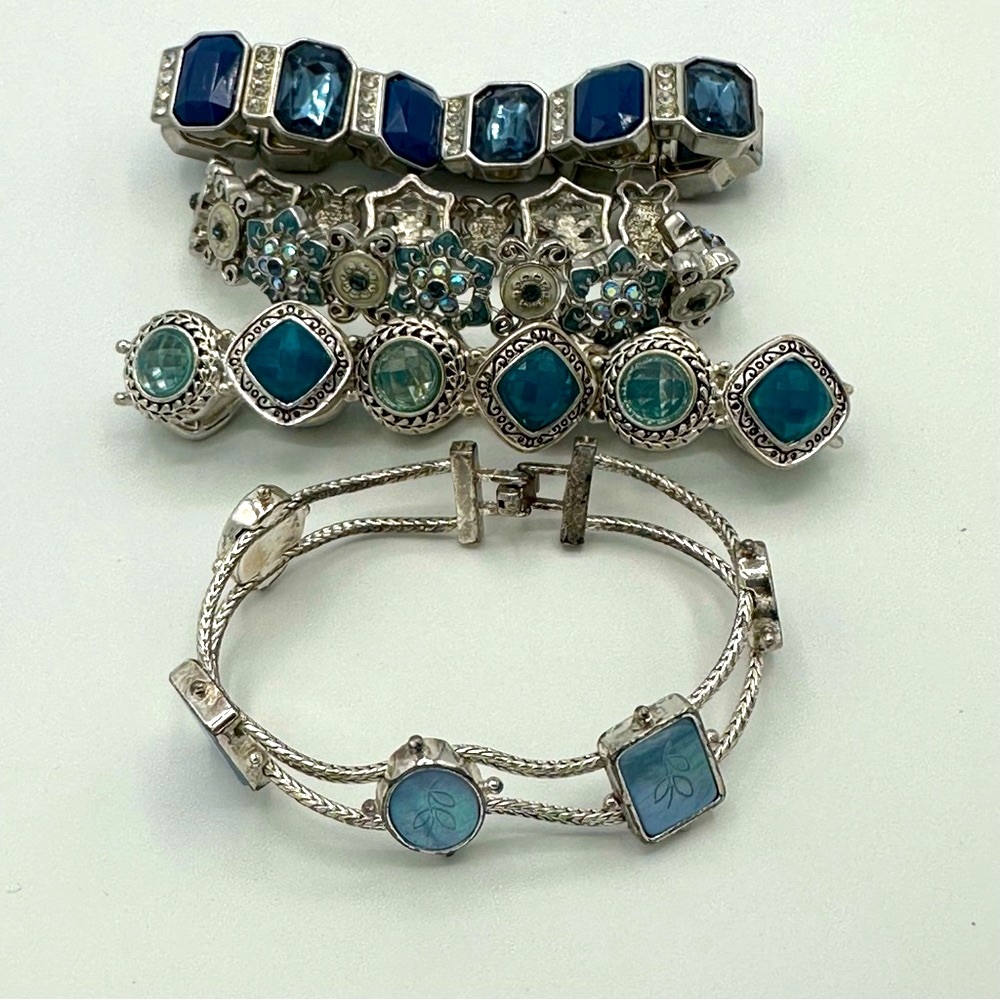 4 really nice bracelets, 1 is a Napier.They’re not magnetic. (SKU 188)